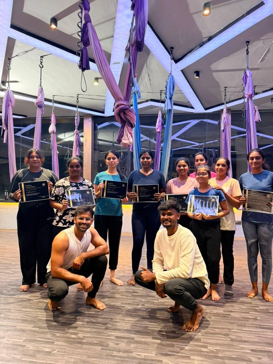 Aerial hammock teacher training graduation ceremony at Rtam Yoga Studios